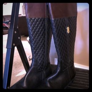 Genuine Leather black/Tan Cole Haan boots.